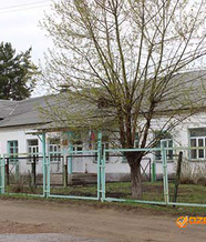 Здание школы № 11 г.  Кыштым, на котором размещена мемориальная доска М. Аношкину